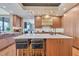 Modern kitchen with island and high-end appliances at 50 Central Ave # 17Phc, Sarasota, FL 34236