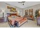 Luxurious bedroom with a king-size bed and sitting area at 50 Central Ave # 17Phc, Sarasota, FL 34236