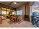 Relaxing patio features dining area and city views at 50 Central Ave # 17Phc, Sarasota, FL 34236