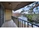 Relaxing balcony overlooking a serene lake and fountain at 947 Sunridge Way # A-3, Sarasota, FL 34234