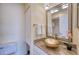 Updated bathroom with granite vanity and a stylish vessel sink at 947 Sunridge Way # A-3, Sarasota, FL 34234