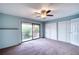 Serene bedroom with double closets and a private balcony at 947 Sunridge Way # A-3, Sarasota, FL 34234