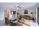 Spacious living room with tile flooring and open layout at 947 Sunridge Way # A-3, Sarasota, FL 34234