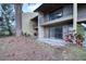 Private patio and exterior of condo building at 947 Sunridge Way # A-3, Sarasota, FL 34234