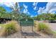 The Meadows Country Club Racquet Club sign at 5122 Marsh Field Rd # 62, Sarasota, FL 34235