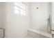 Clean bathroom with a walk-in shower and built-in seat at 3630 Verna Rd, Myakka City, FL 34251