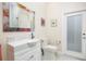 Clean bathroom with white vanity and walk-in shower at 3630 Verna Rd, Myakka City, FL 34251