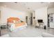 Bright bedroom with large bed and en-suite office at 3630 Verna Rd, Myakka City, FL 34251