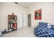 Cozy bedroom with built-in bookcase and daybed at 3630 Verna Rd, Myakka City, FL 34251