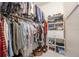 Large walk-in closet with ample hanging space and shelving at 3630 Verna Rd, Myakka City, FL 34251