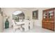 Elegant dining room with white table and antique furniture at 3630 Verna Rd, Myakka City, FL 34251
