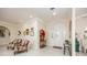 Bright entryway with decorative hat stand and console table at 3630 Verna Rd, Myakka City, FL 34251