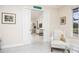 Elegant hallway with pocket doors leading to additional rooms at 3630 Verna Rd, Myakka City, FL 34251