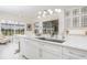 Spacious kitchen featuring island, stainless steel appliances, and white cabinetry at 3630 Verna Rd, Myakka City, FL 34251