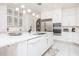 Spacious kitchen with stainless steel appliances and a large island at 3630 Verna Rd, Myakka City, FL 34251