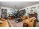 Elegant library with built-in bookshelves and comfortable seating at 3630 Verna Rd, Myakka City, FL 34251