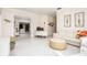 Living room with curved desk and view into another room at 3630 Verna Rd, Myakka City, FL 34251