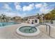 Community hot tub and pool area at 1215 S Portofino Dr # 404, Sarasota, FL 34242