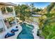 Luxury waterfront home with pool and private dock, offering stunning sunset views at 1243 Starboard Ln, Sarasota, FL 34242