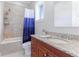 Bathroom with granite countertop and walk-in shower at 1243 Starboard Ln, Sarasota, FL 34242