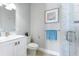 Clean bathroom with white vanity, toilet and shower at 1243 Starboard Ln, Sarasota, FL 34242