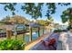 Private dock with boat lift and seating area at 1243 Starboard Ln, Sarasota, FL 34242