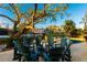 Firepit surrounded by chairs on patio at 1243 Starboard Ln, Sarasota, FL 34242