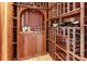 Custom-built wine cellar with ample storage for wine bottles at 1243 Starboard Ln, Sarasota, FL 34242