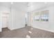 Bright bedroom with wood floors and access to balcony at 4322 Marina View Way, Cortez, FL 34215