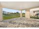 Large patio with pavers and a view of a grassy area at 4322 Marina View Way, Cortez, FL 34215