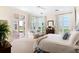 Bright bedroom with access to patio and water views at 4511 Bay Shore Rd, Sarasota, FL 34234