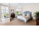 Spacious bedroom with water views and sitting area at 4511 Bay Shore Rd, Sarasota, FL 34234