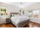 Bedroom with hardwood floors, and water views at 4511 Bay Shore Rd, Sarasota, FL 34234