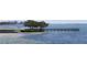 Wooden dock extending into the water at 4511 Bay Shore Rd, Sarasota, FL 34234