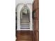 Interior view of entryway with staircase and hardwood floors at 4511 Bay Shore Rd, Sarasota, FL 34234