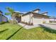 Two-car garage villa with walkway, landscaping, and paver driveway at 17890 Cherished Loop, Bradenton, FL 34211