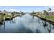 Scenic view of a peaceful canal with waterfront homes at 5234 Cooper Ter, Port Charlotte, FL 33981