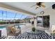 Covered patio overlooking the pool at 5234 Cooper Ter, Port Charlotte, FL 33981