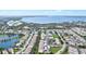 Aerial view of a residential community situated near a large body of water at 7201 29Th Avenue W Dr # 306, Bradenton, FL 34209