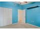 Bright bedroom with double door closet and ceiling fan at 7201 29Th Avenue W Dr # 306, Bradenton, FL 34209