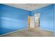 Blue bedroom with access to bathroom at 7201 29Th Avenue W Dr # 306, Bradenton, FL 34209