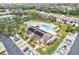 An aerial view of a community pool, clubhouse, and surrounding areas at 7201 29Th Avenue W Dr # 306, Bradenton, FL 34209