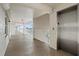 Clean condo hallway with elevator access and exit signage at 7201 29Th Avenue W Dr # 306, Bradenton, FL 34209