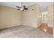 Spacious living room with carpeted floor and wood flooring near entry at 7201 29Th Avenue W Dr # 306, Bradenton, FL 34209