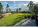 Community dog park with grassy area, seating, and waste disposal at 1045 Crosswind Ave, Sarasota, FL 34240