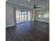 Spacious living area with sliding doors leading to the backyard at 150 Rotonda Cir, Rotonda West, FL 33947