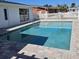 Inviting rectangular pool with paver deck at 150 Rotonda Cir, Rotonda West, FL 33947