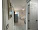 View into bedroom showcasing neutral decor and carpet and ensuite bathroom at 15618 Castle Park Ter, Lakewood Ranch, FL 34202