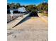 Community boat ramp featuring an adjacent camper and boats for easy water access at 68 4Th Ave, Venice, FL 34285