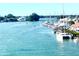 Water view of the canal and sailboats, creating a vibrant and engaging waterfront lifestyle at 68 4Th Ave, Venice, FL 34285